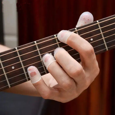 Lengan Pelindung Jari Silikon Lembut Tahan Panas Untuk Gitar Anti Nyeri